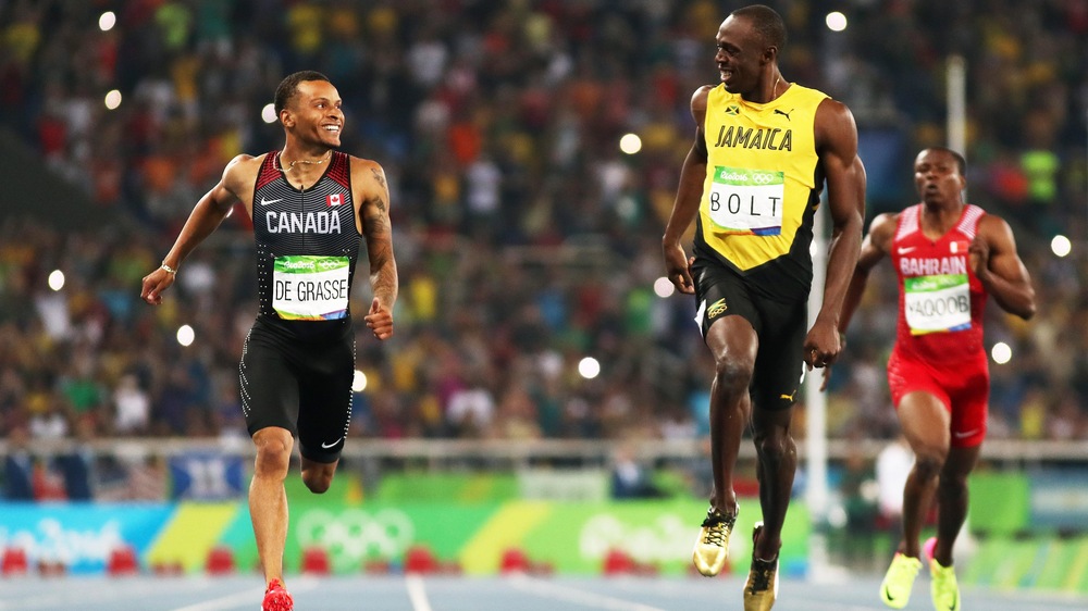 Andre De Grasse et Usain Bolt en demi-finale du 200 m aux Jeux de Rio