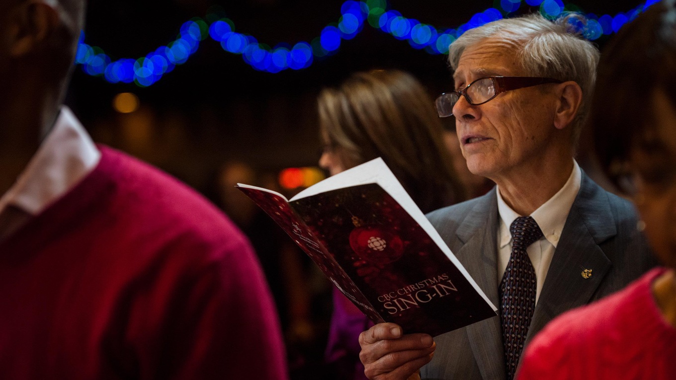 Members of the audience join in the singing of their favourite carols at the 38th CBC Christmas Sing-In in Montreal.