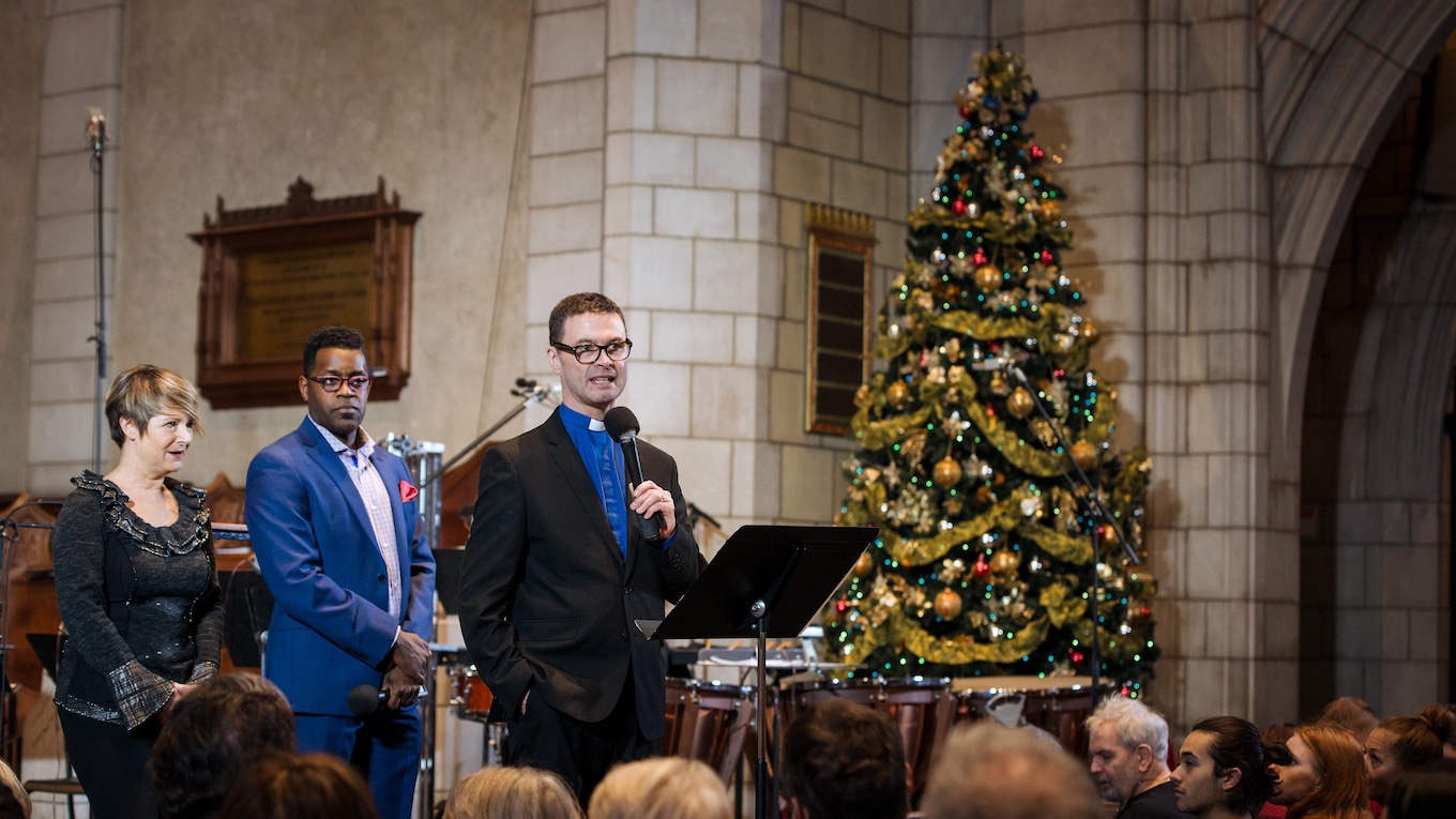 Rev. Glenn Chestnutt welcomes the public to the Church of St. Andrew and St. Paul for the 2017 CBC Christmas Sing-In.