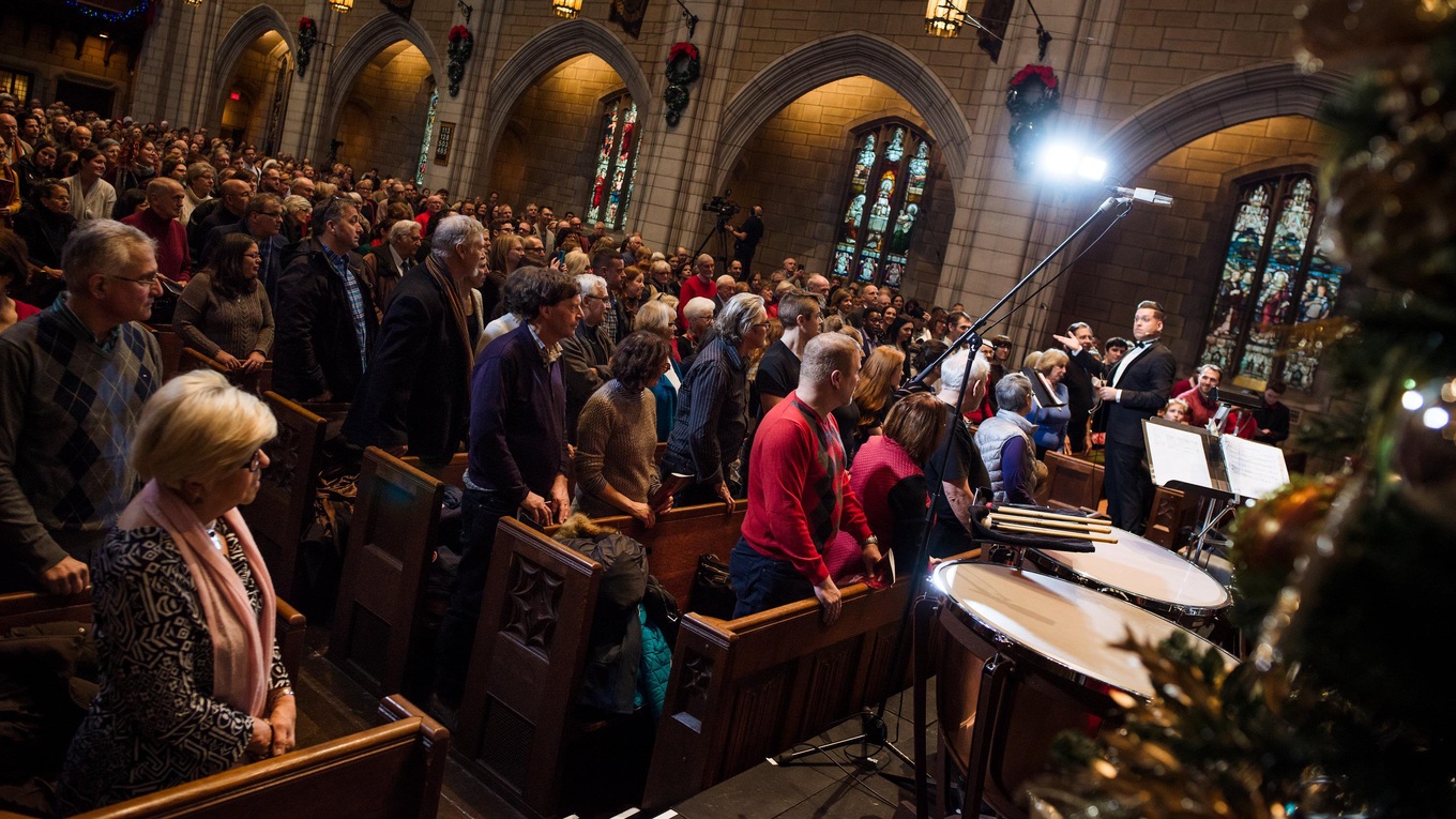 Conductor Jean-Sébastien Vallée rehearses the crowd prior to the start of the 2017 CBC Christmas Sing-In in Montreal.