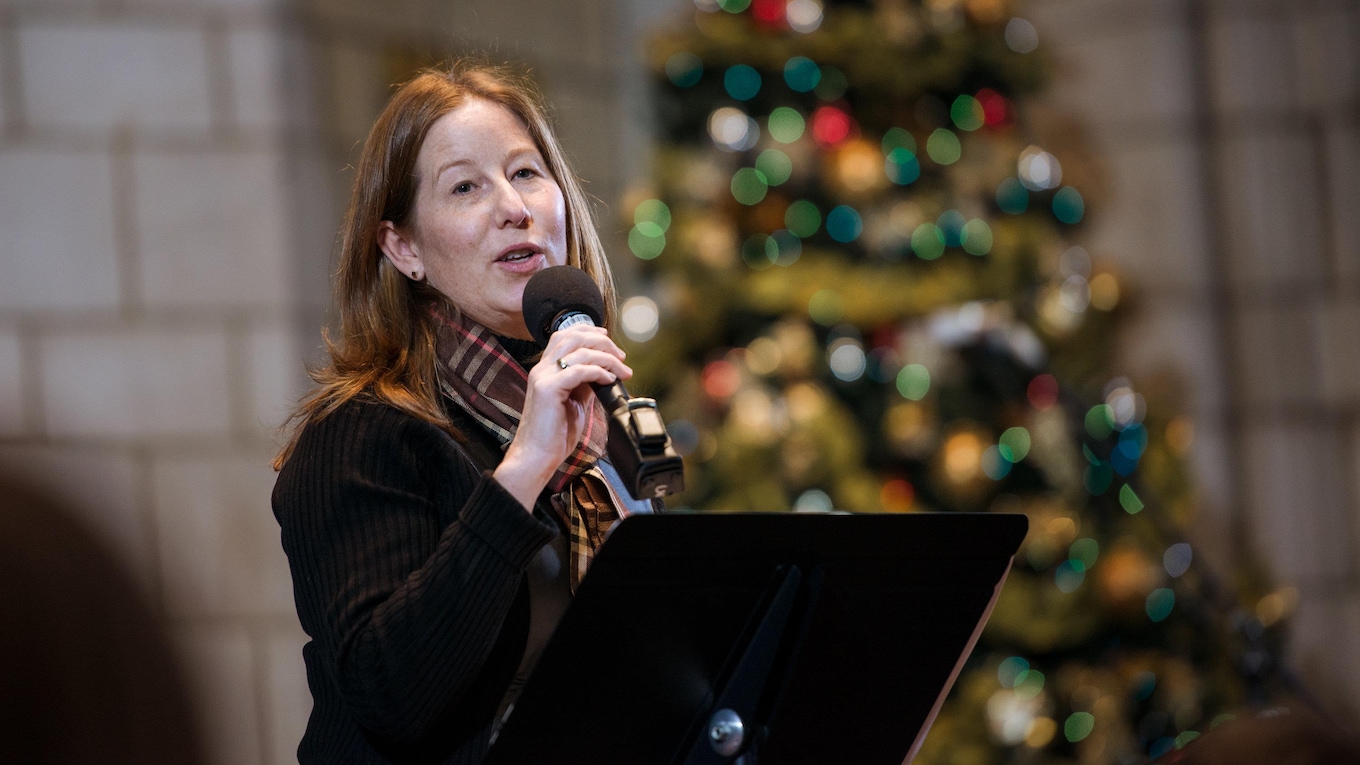 Leanne Bayer, executive director of West Island Community Shares, addresses the public at the 2017 CBC Christmas Sing-In in Montreal.
