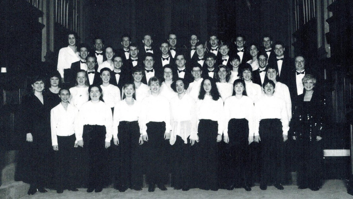 The late Diane Loomer, bottom right, was the first woman to conduct the NYCC, pictured here in 1994.