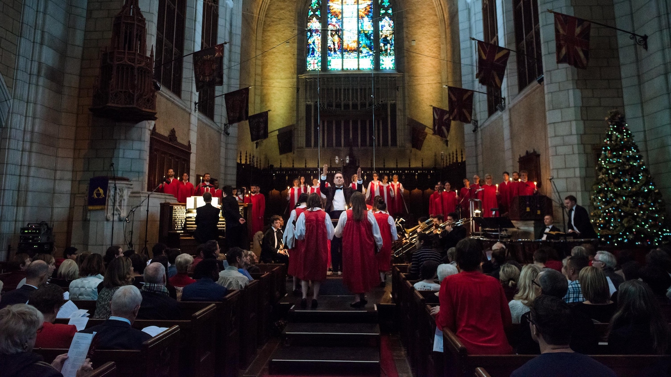 The Choir of the Church of St. Andrew and St. Paul proceeds to the stalls while singing 'Once in Royal David's City.'