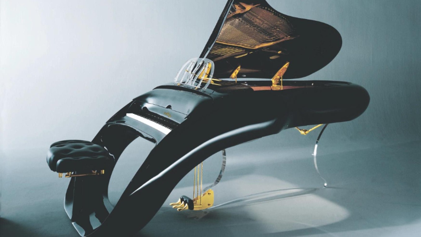 The Schimmel Pegasus Piano has an ergonomic curved keyboard and a fully adjustable leather stool.