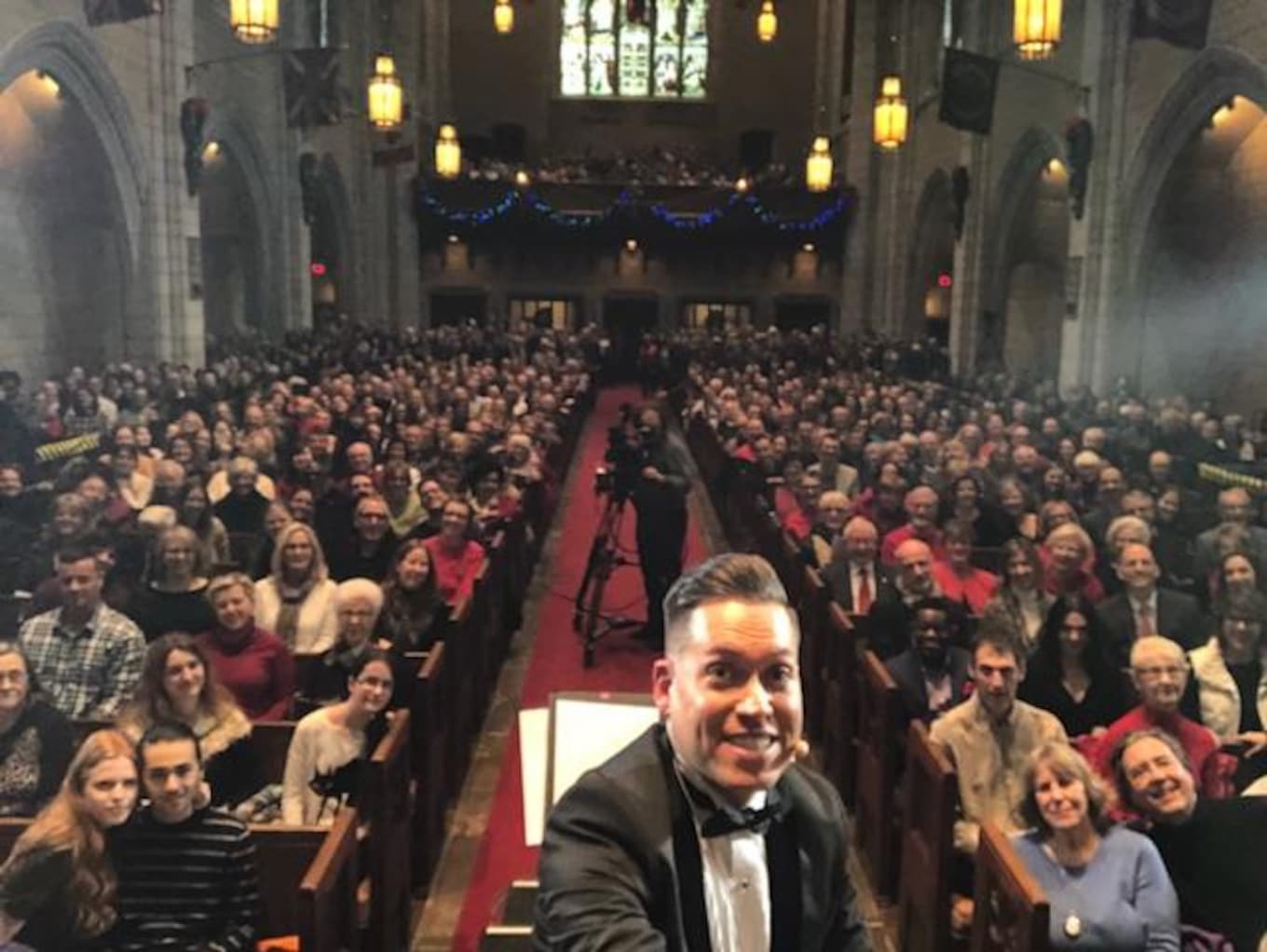 Conductor Jean-Sébastien takes a group selfie at the 2017 CBC Christmas Sing-In.