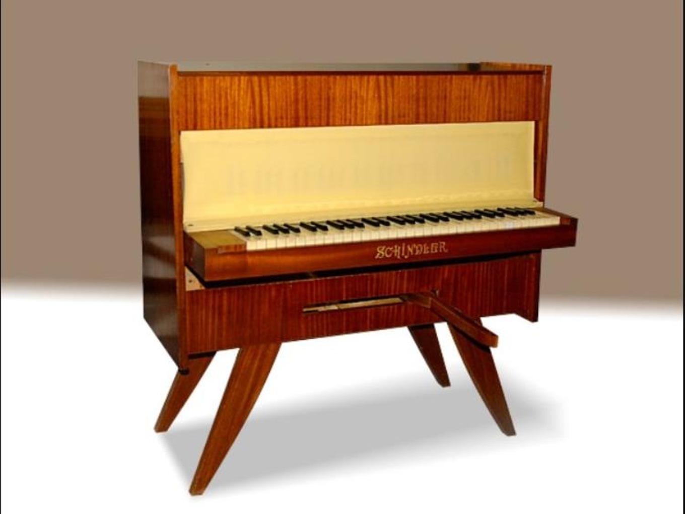 The Schindler yacht piano has a folding keyboard.