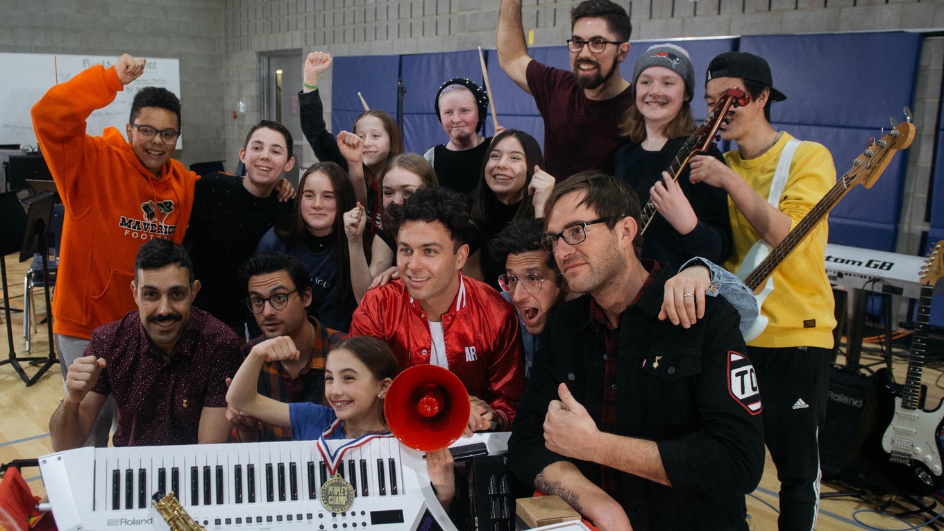 It was all smiles at the Calgary Arts Academy when the Arkells paid the music class a surprise visit. Photo Rob Loud.