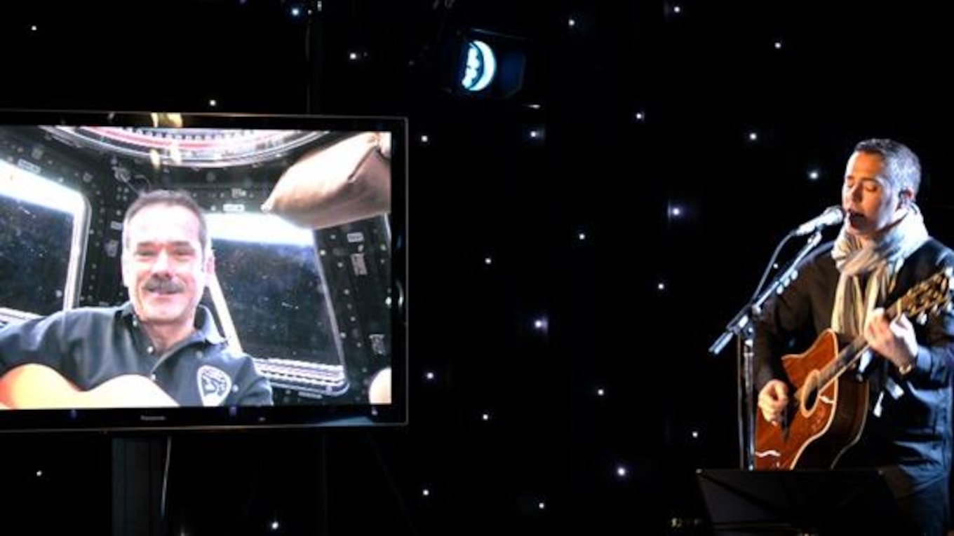 Ed Robertson and Chris Hadfield perform their collaboration together.