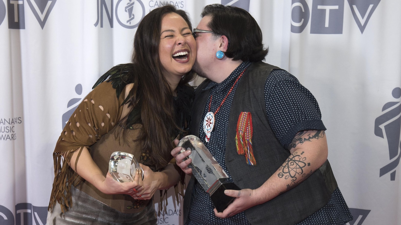 Quantum Tangle celebrate their win for Indigenous music album of the year.