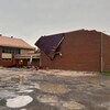 École endommagée par de violents orages.