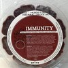 Un contenant de smoothie congelé Immunity de la marque EVIVE. 