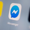 Le logo de l'application Messenger sur un écran de téléphone. 