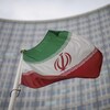 Le drapeau de l'Iran flotte devant l'Agence internationale de l'énergie atomique.