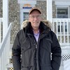 Michel Lévesque prend la pose devant le bureau municipal de La Corne.