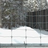 Le grillage et un mur de géotextile érigé pour contenir les caribous dans l'enclos.