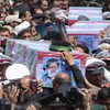 Les cercueils drapés du président Ebrahim Raisi et de ses compagnons tués dans un accident d'hélicoptère dimanche, lors de leur cérémonie funéraire dans la ville de Machhad, en Iran, le jeudi 23 mai 2024.