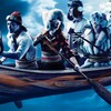 Trois hommes et deux femmes en habits d'hiver sont en mouvement dans un canot qui flotte dans le ciel. 