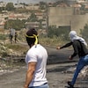 Manifestants palestiniens et forces israéliennes.