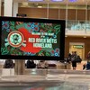 Un panneau sur lequel se trouve le logo de la Fédération métisse du Manitoba et le slogan « Bienvenue dans le coeur de la patrie des Métis de la rivière Rouge ».