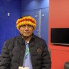 Un homme autochtone péruvien au Palais des congrès de Montréal dans le cadre de la COP15.