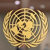 Le logo de l'Organisation des Nations unies, couleur dorée