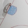 Un filet de hockey sur une patinoire. Image générique, neutre. 