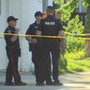La police sur la scène après qu'un homme a été tué par balle à l'angle de la rue Salter et de l'avenue Mountain à Winnipeg, le 17 juin 2022.