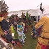 Des membres de la Première Nation crie James Smith portant des regalia lors d'un pow-wow, le 25 mai 2023.
