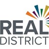 Le logo de REAL District.