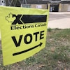 Un panneau indiquant un bureau de vote.