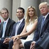 Eric, Ivanka et Donald Jr sont assis en compagnie de leur père, lors d'une cérémonie se déroulant au Trump International Hotel de Washington.