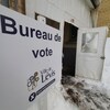 Une affiche indiquant un bureau de vote.