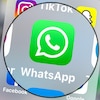 Le logo de l'application WhatsApp est mis en évidence sur un écran de téléphone cellulaire.