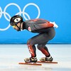 Charles Hamelin en pleine action lors de l'épreuve de patinage de vitesse courte piste. 