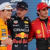Trois pilotes de F1 posent pour la photo.