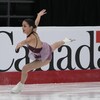 Madeline Schizas en pleine performance sur la patinoire. 