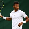 Félix Auger-Aliassime réagit après un point perdu.