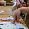 Des enfants font du coloriage et du bricolage dans une garderie de Regina, en Saskatchewan, le 6 mars 2023.