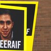Affiche du visage de Raif Badawi avec le mot-clic #freeraif écrit en dessous.
