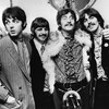 Photo des quatre Beatles en noir et blanc.