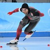 L'athlète du Canada en pleine action sur la patinoire. 