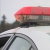 Les gyrophares d'une voiture de police de la Sûreté du Québec.
