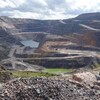 Quelques camions lourds se promènent dans la mine à ciel ouvert de Mont-Wright, à proximité de Fermont. 