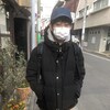 Un Japonais de 38 ans portant un masque médical.