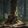 Une image officielle du jeu «The Last of Us Part II». On y voit un personnage jouer de la guitare dans une forêt.