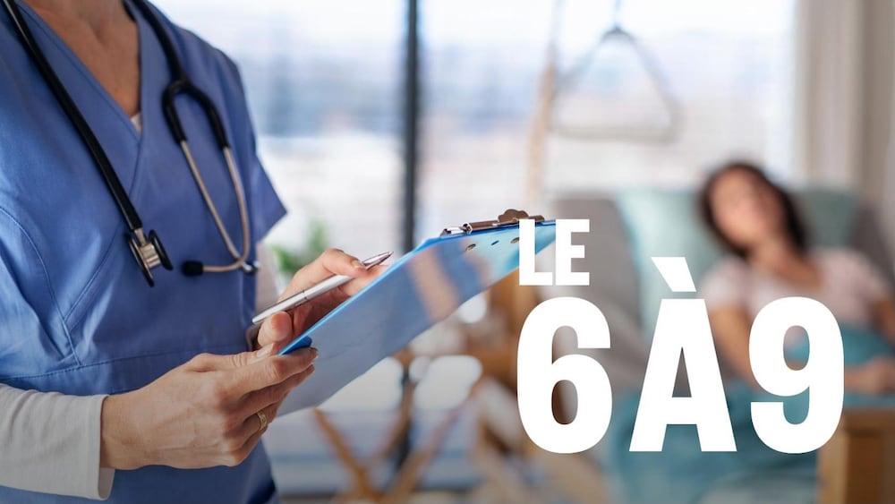 Une infirmière au chevet d'une patiente