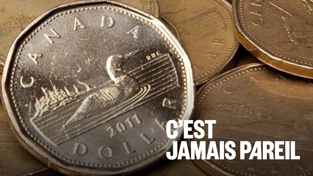 Des pièces de monnaie reposent les unes sur les autres. 