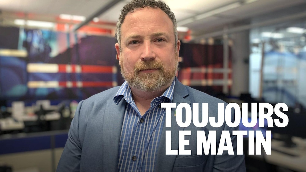Le maire de Trois-Rivières, Jean Lamarche, dans la salle de nouvelles de Radio-Canada à Trois-Rivières.