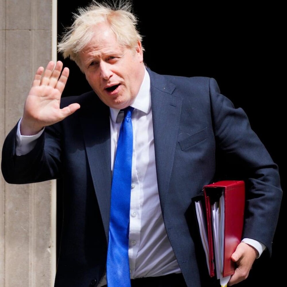British Prime Minister Boris Johnson gestures as he leaves 10 Downing Street in London on Wednesday, July 6, 2022.