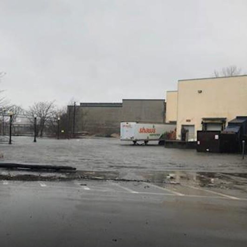 The supermarket parking lot was flooded.